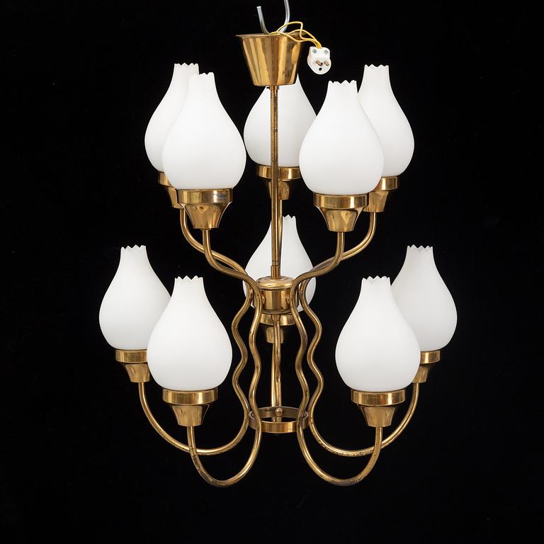 A brass and glass ceiling lamp for ten lights, first half 20th century.