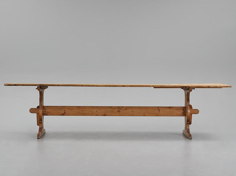 A pine trestle table, 20th century incorporating older elements.
