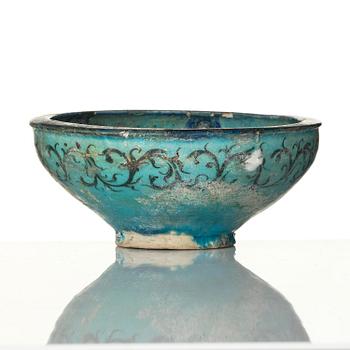 A luster earthenware bowl, Kashan, central Persia, 13th century.