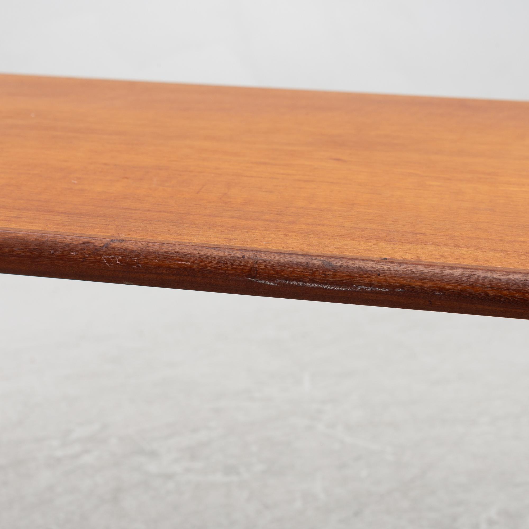 A teak coffee table and two side tables, Scandinavia, 1960's/70's.
