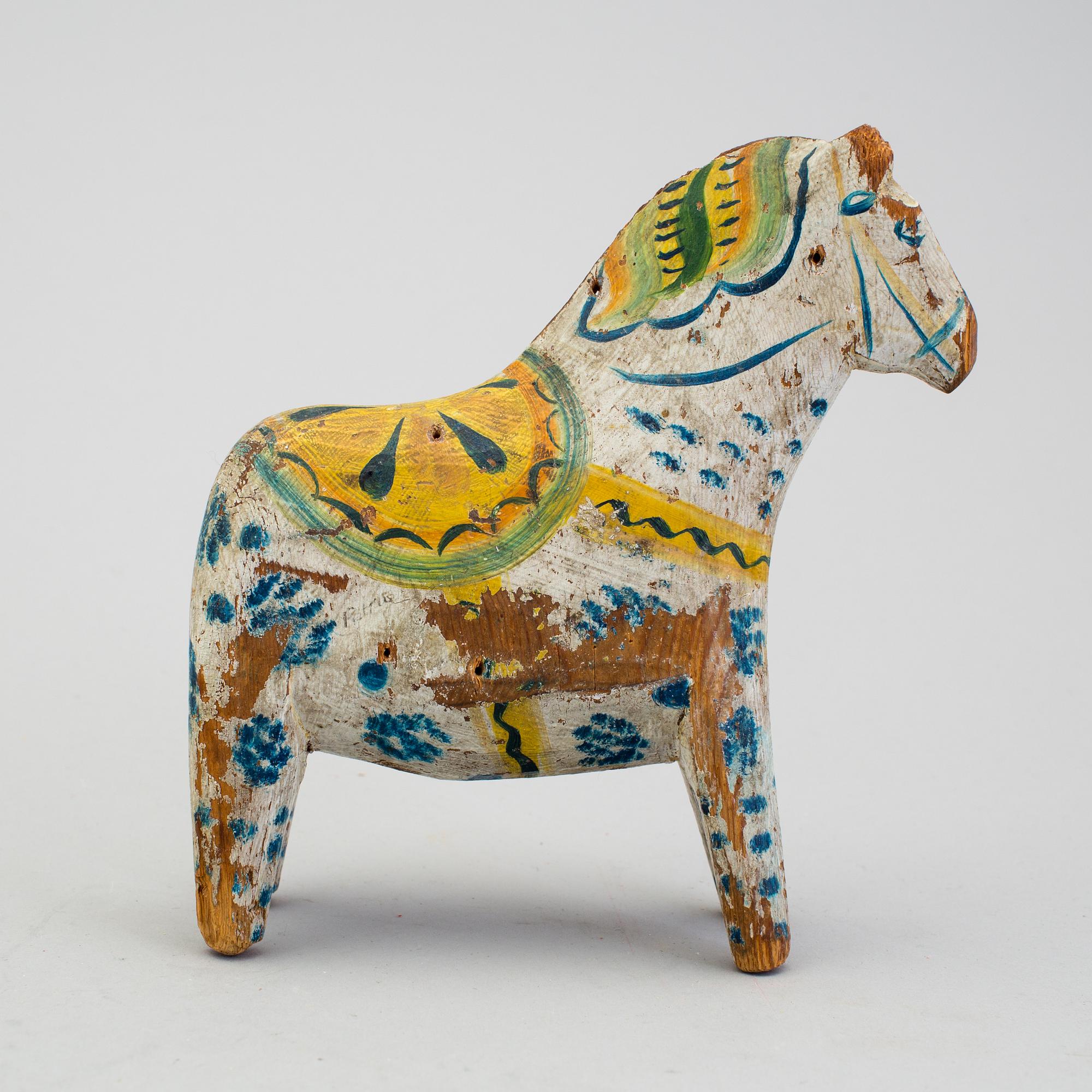A painted folk art dala horse first half of the 20th century.