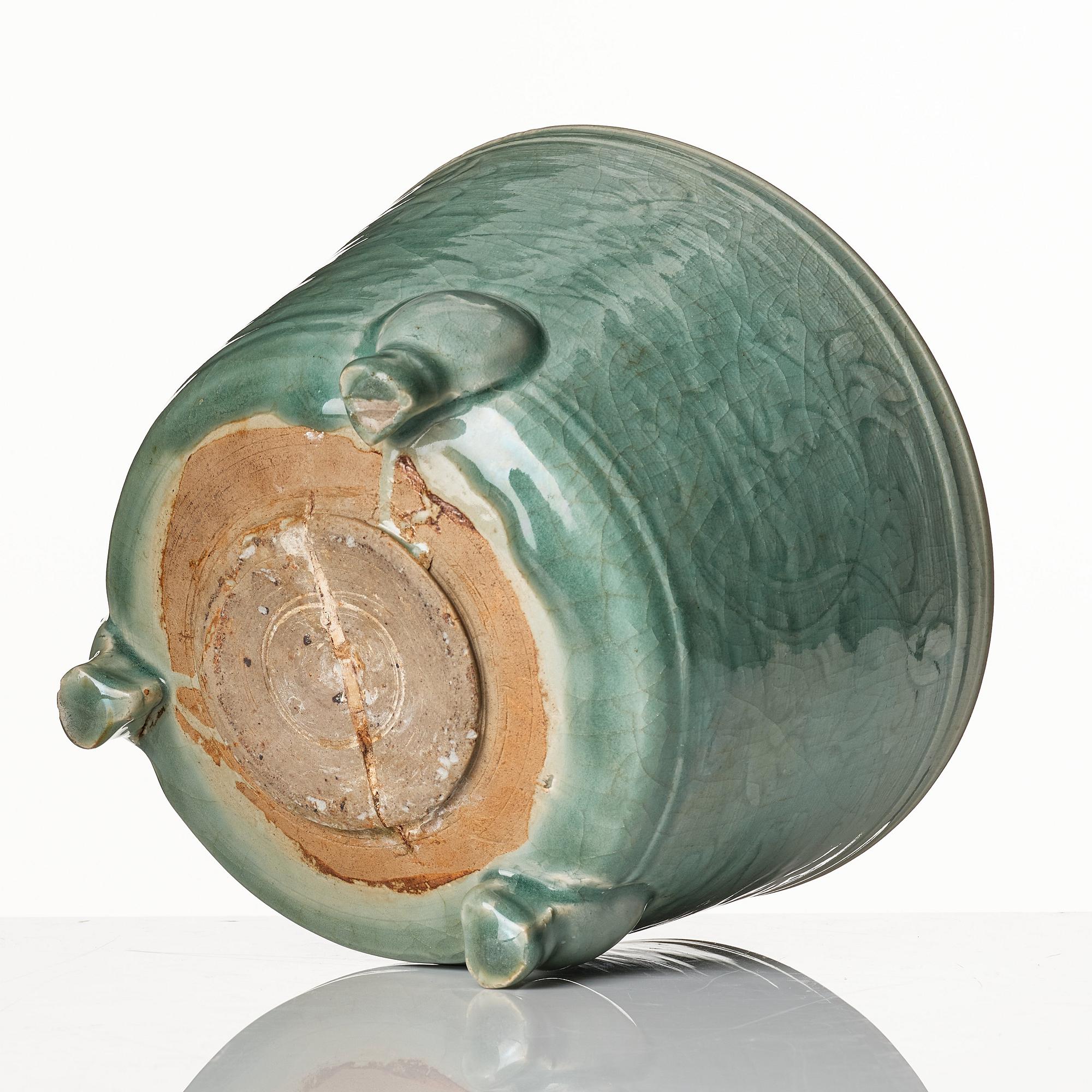 A large celadon tripod censer, Ming dynasty (1368-1644).