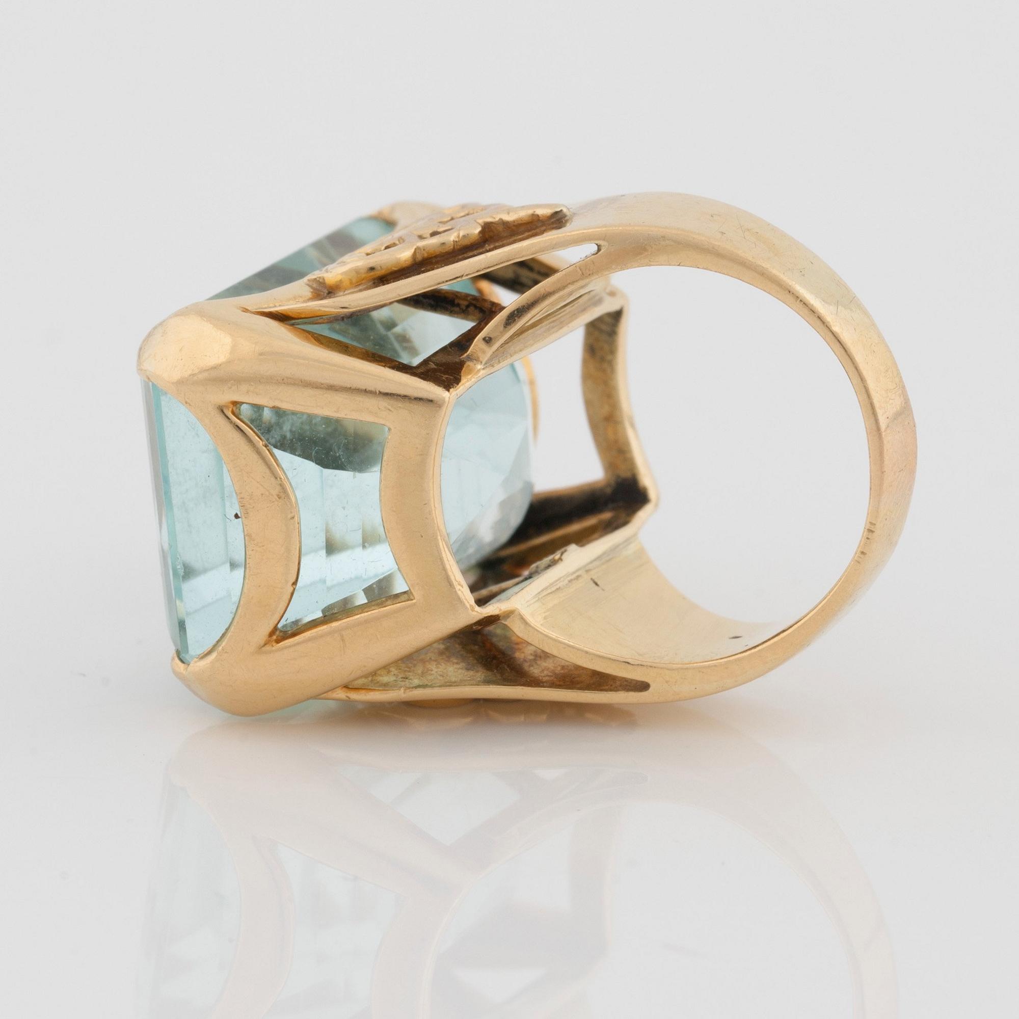 A circa 45.00 ct step cut aquamarine ring.