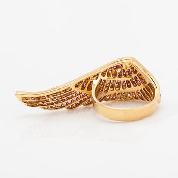 Garrard, An 18K gold ring "Wings" with rubies. Marked Garrard 52 Austria.