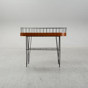 A 1950-60s plant stand.