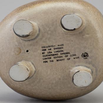 A stoneware figurine by Lisa Larson.