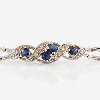 Arm bracelet, 18K white gold with small octagon-cut diamonds and sapphires.