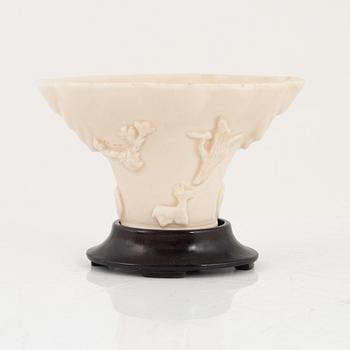 A blanc de chine libation cup, Qing dynasty.