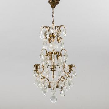 A ROCOCO STYLE CHANDELIER, second half of 20th century.