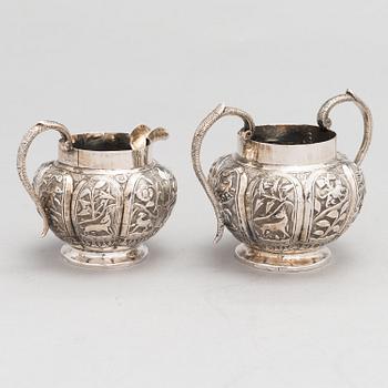 A 3-piece Asian silver tea set, presumably from the mid-20th century.