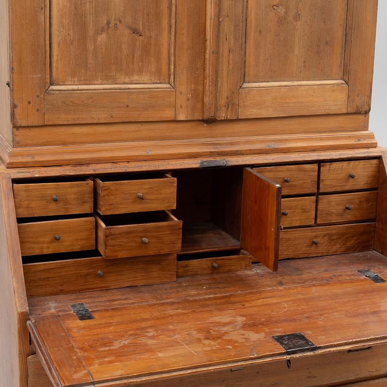 A two-part writing cabinet, around 1800.
