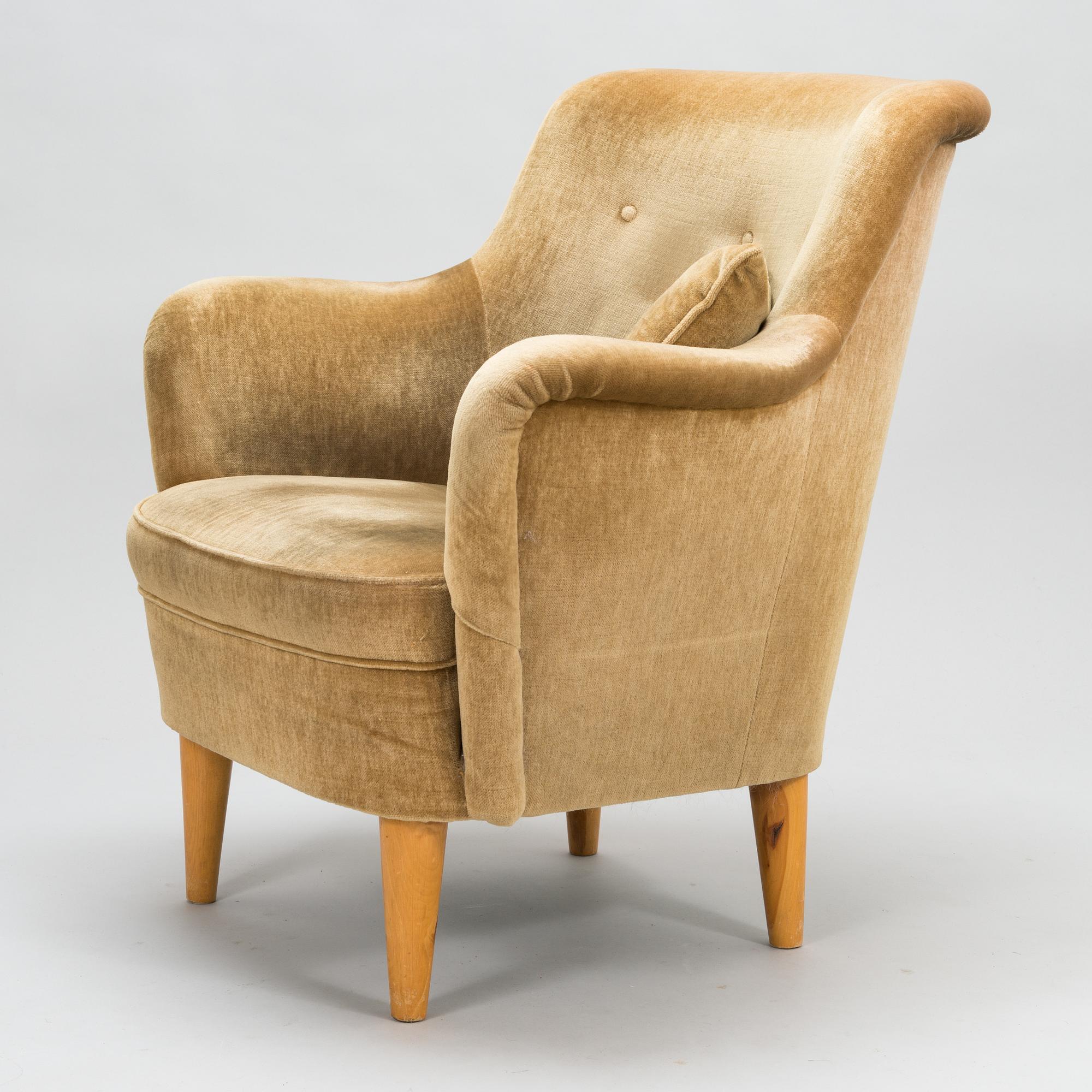 A mid-20th-century sofa and armchair.