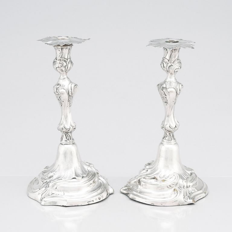 Two Swedish Rococo silver candlesticks, marks of Jakob Lampa, Stockholm 1764 and 1778.