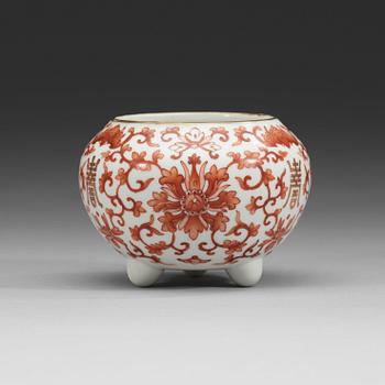 A red lotus tripod brush washer, Qing dynasty, 19th Century.