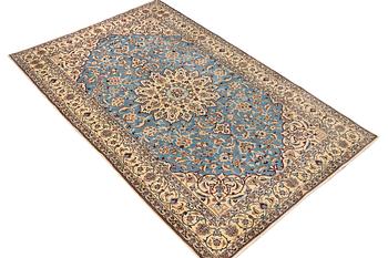 A Nain, part silk carpet, c. 196 x 120 cm.