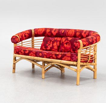 A three-piece bamboo and rattan furniture suite, second half of the 20th Century.