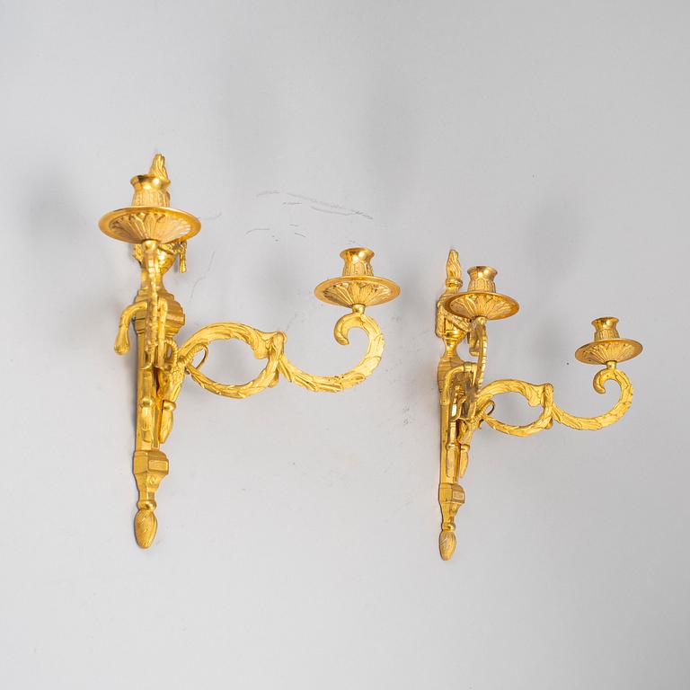 A 20th Century pair of Louis XVI style wall sconces.