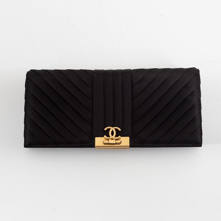 Chanel, a black satin clutch, 2019.