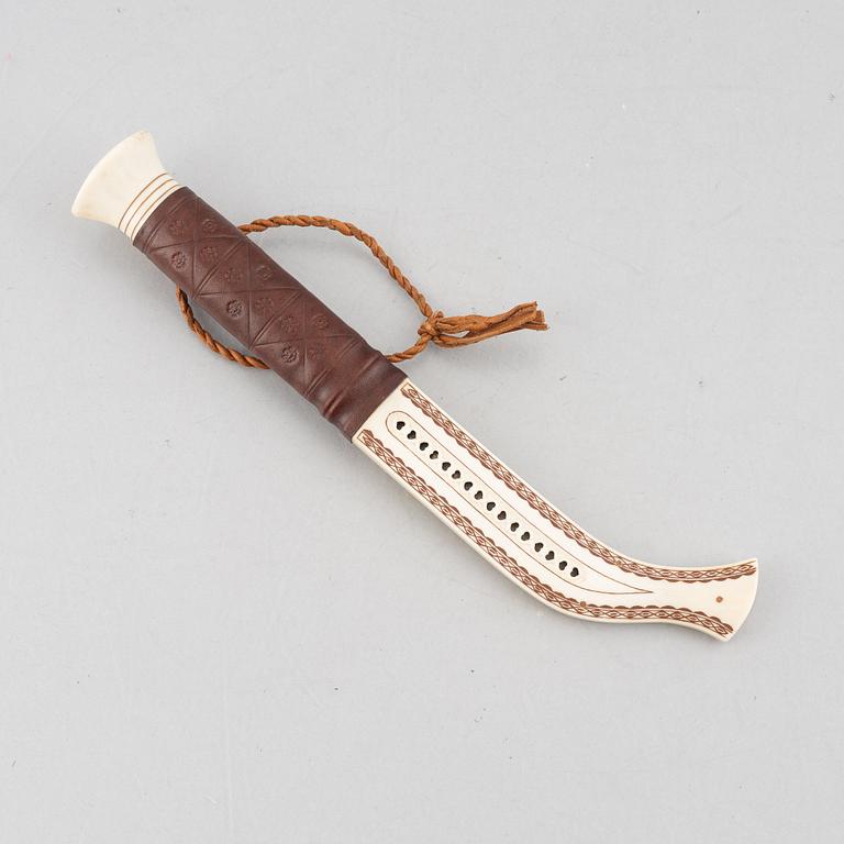 Per Anders Nutti, a reindeer antler knife, signed.