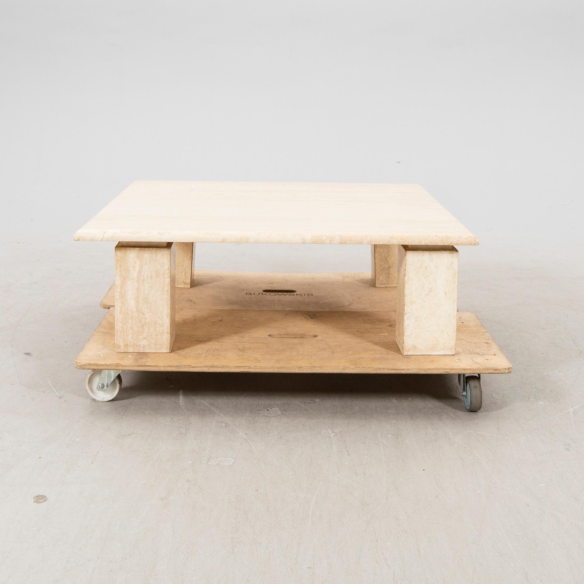 A late 20th vcentury travertine coffee table.