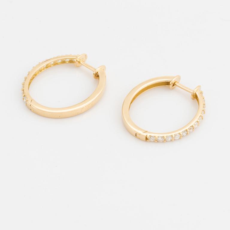 Brilliant cut diamond hoop earrings.