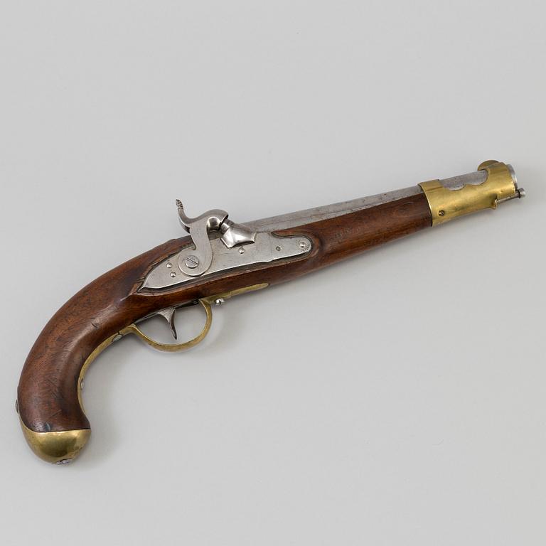 A first half of the 19th century percussion lock pistol.