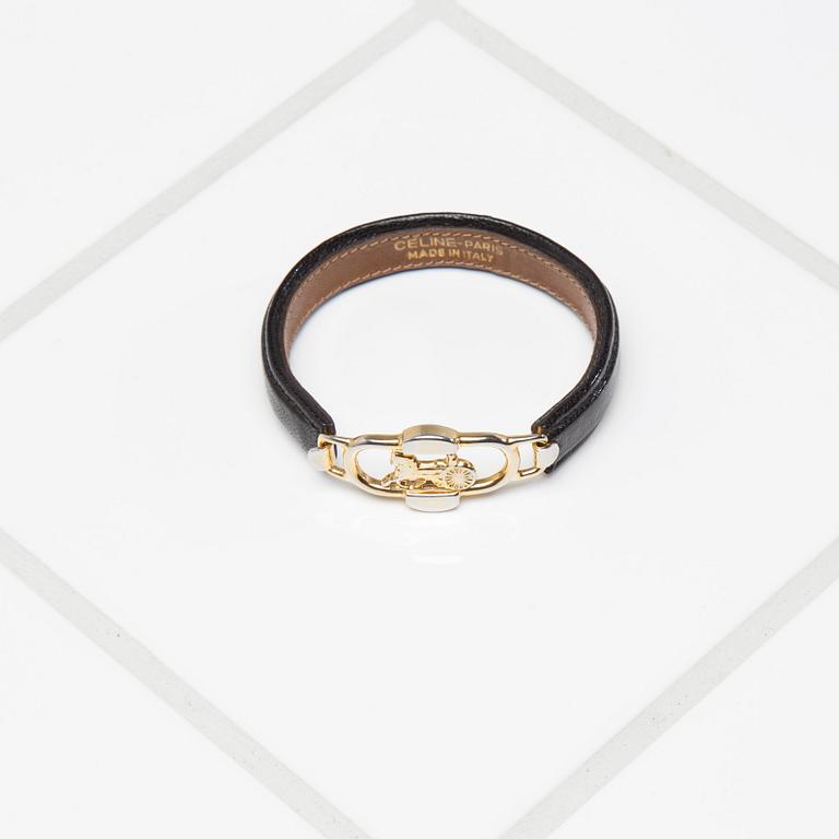 ARMBAND, Celine.