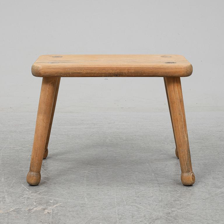 A pine stool, second half of the 20th century.