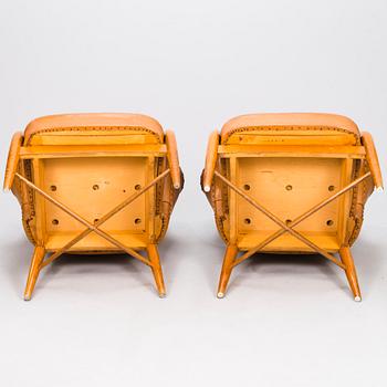 CARIN BRYGGMAN, A pair of 1950s armchairs for Kirjopuu, Finland.