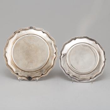 A Swedish 20th century set of four silver plates mark of CG Hallberg and GA Dahlgren Sthlm and  Malmö 1907 and 1917.