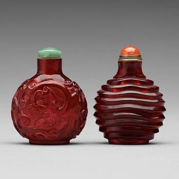 Two Chinese Peking glass snuff bottles, 20th Century.