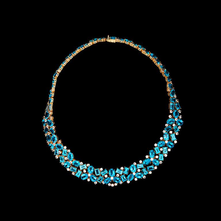 A blue topaz and white sapphire necklace.
