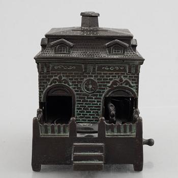 A mechanical bank, late 19th century, probably by Judd Manuf. Comp.
