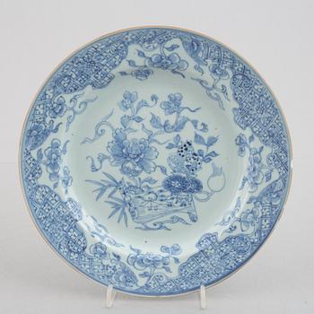 A group of four blue and white dishes and a cabaret piece, Qing dynasty, 18th century.