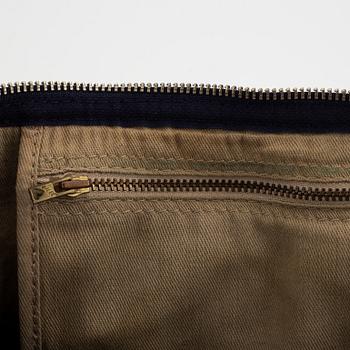 Christian Dior, a canvas handbag, toilet bag and key holder.