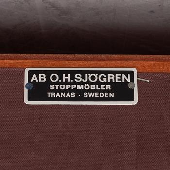Carl Malmsten, a pair of 'Husfadern' armchairs, OH Sjögren 1988.