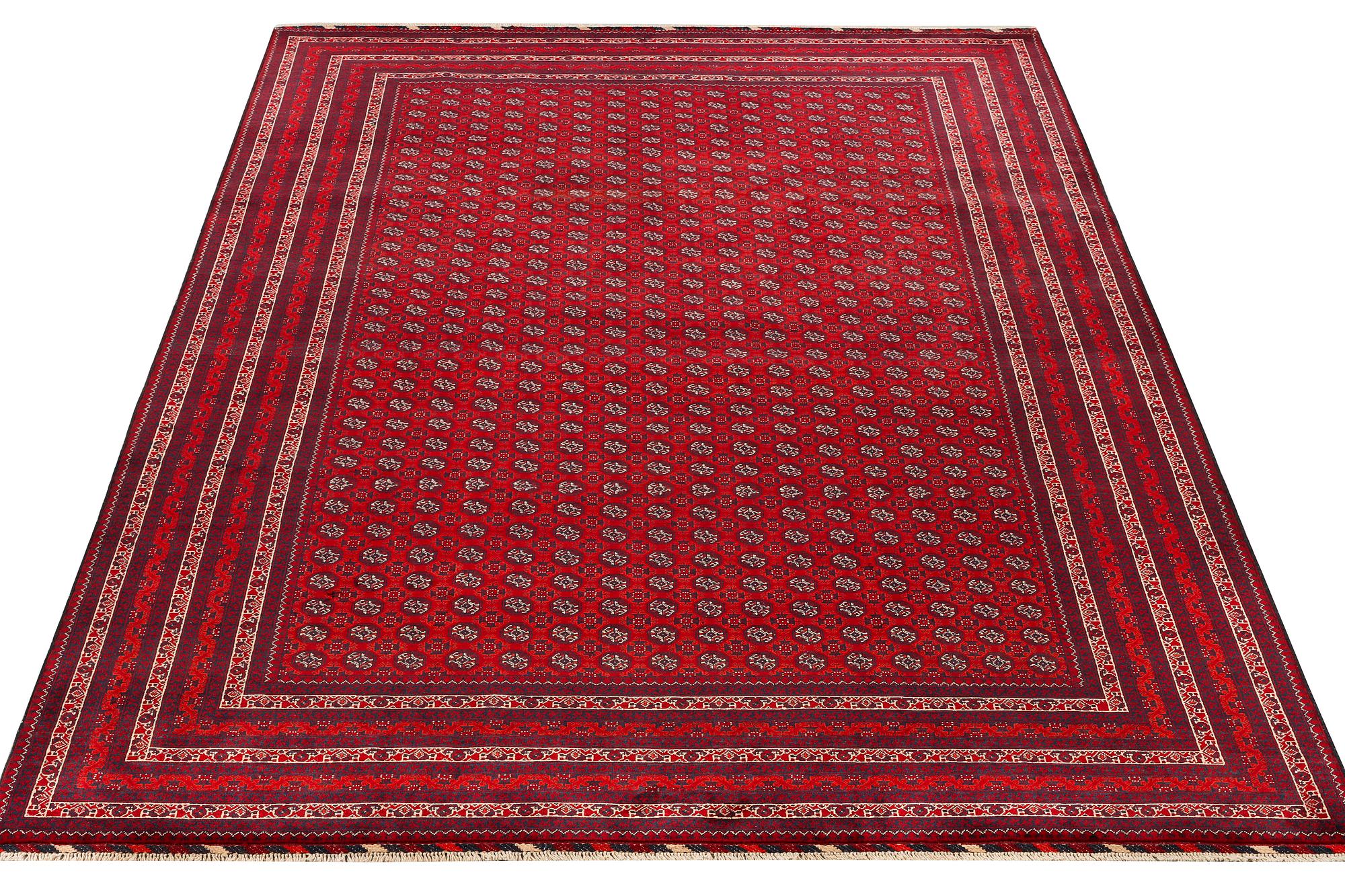 An Afghan carpet, c. 292 x 200 cm.