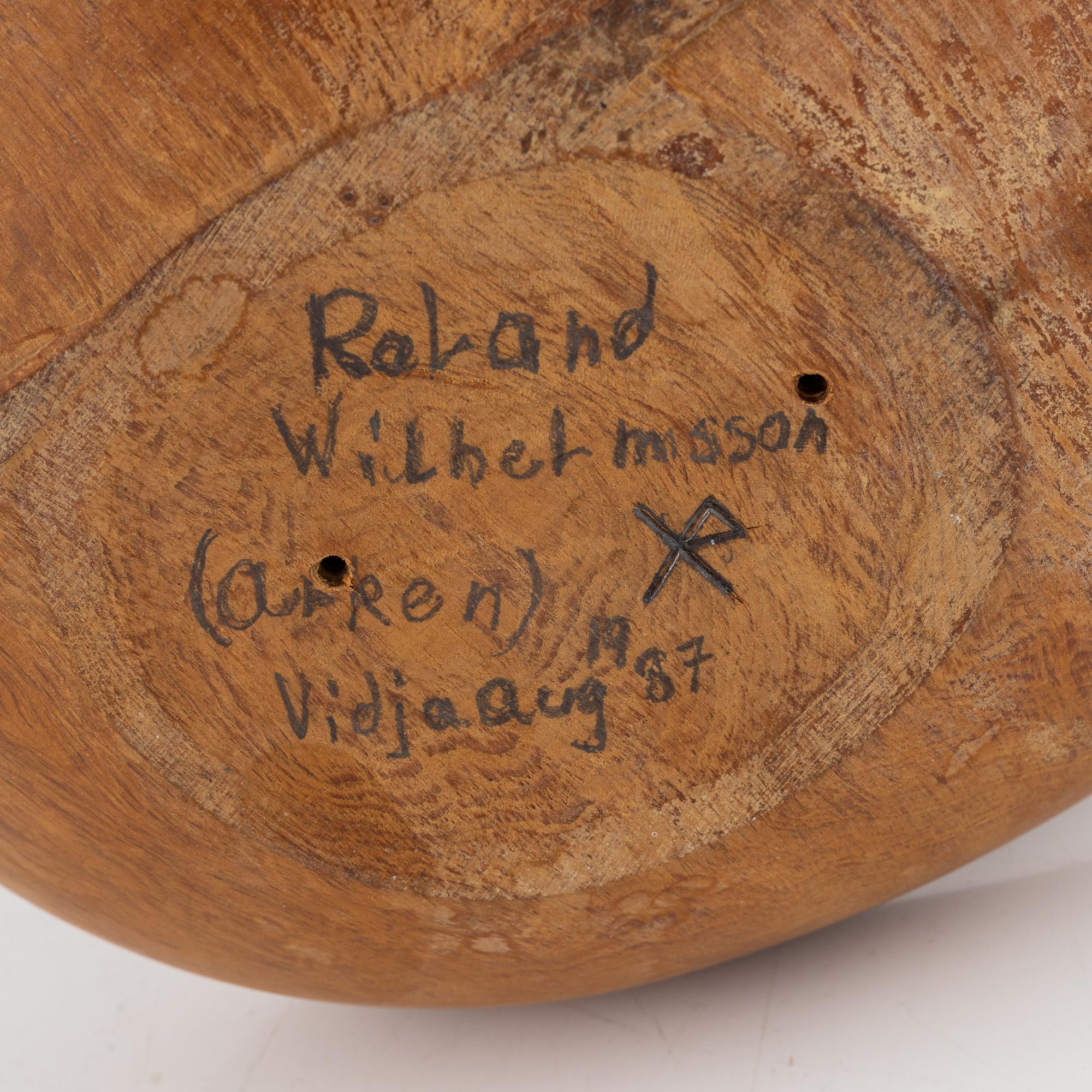 Roland Wilhelmsson, a wooden sculpture, signed and with pencil dated 1987.