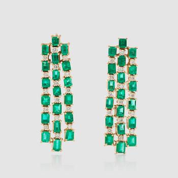 1400. A pair of emarald and brilliant-cut diamond earrings.