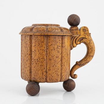 A 19th Century birch Baroque style tankard.