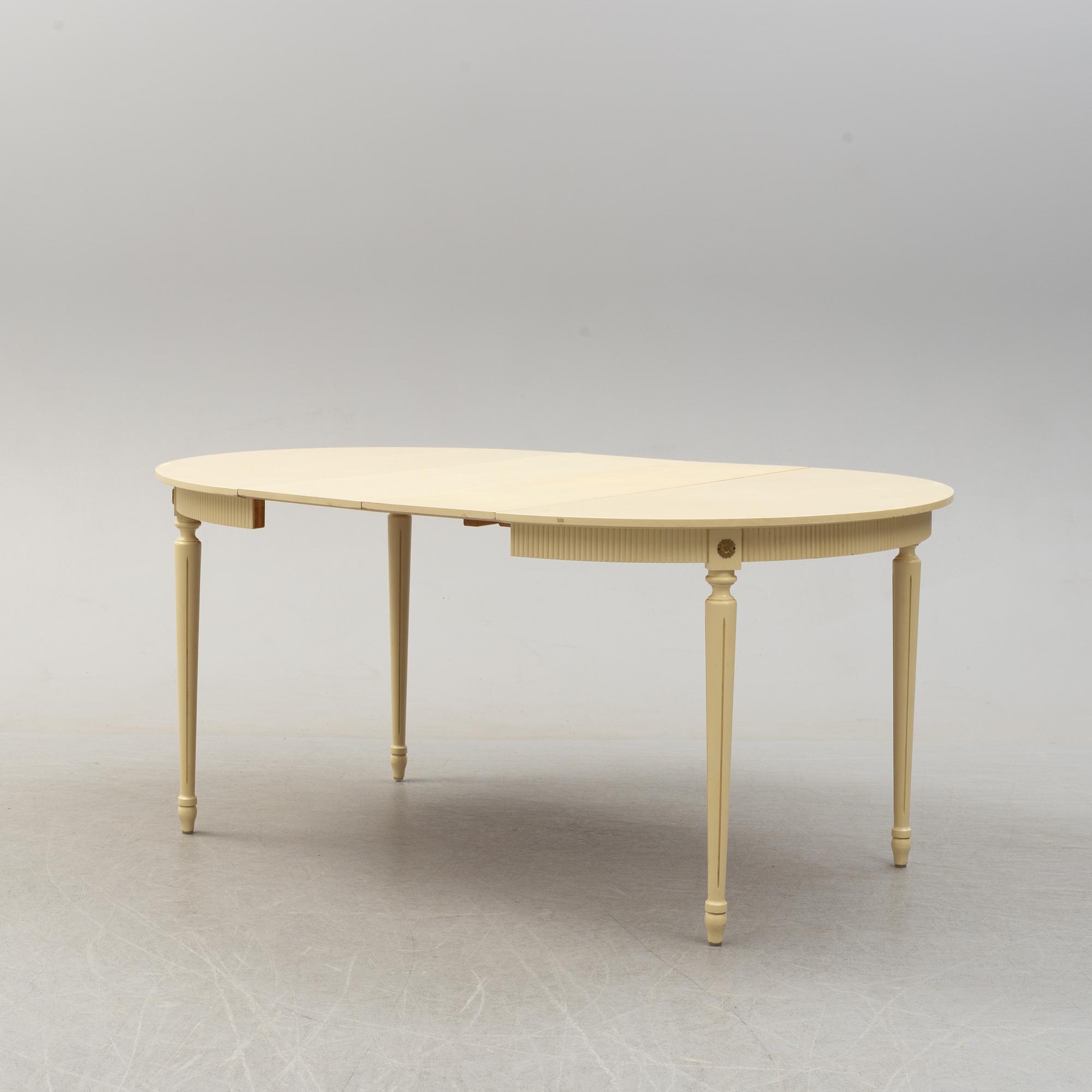 A set of six chairs and a dining table, gustavian style, late 20th century.