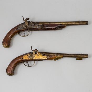 Two percussion lock pistols from around year 1800. Changed from flint lock to percussion lock.