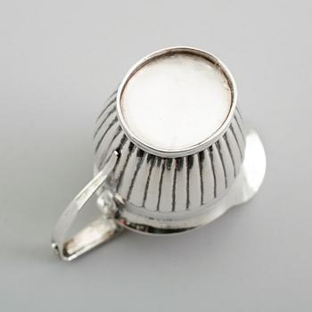 GRÄDDKANNA, silver, Gustaf Folcker, Stockholm 1834. Vikt ca 81 gram.