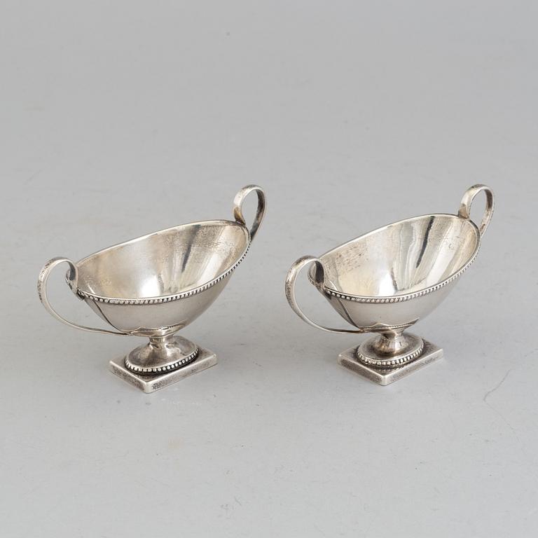 a pair of silver salt cellars, London, 1877.