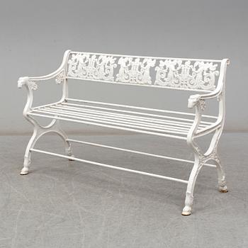 A cast iron garden sofa, empirestyle, circa 1900.