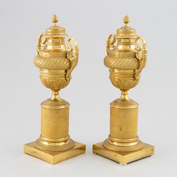 A pair of French Empire candlesticks, early 19th century.