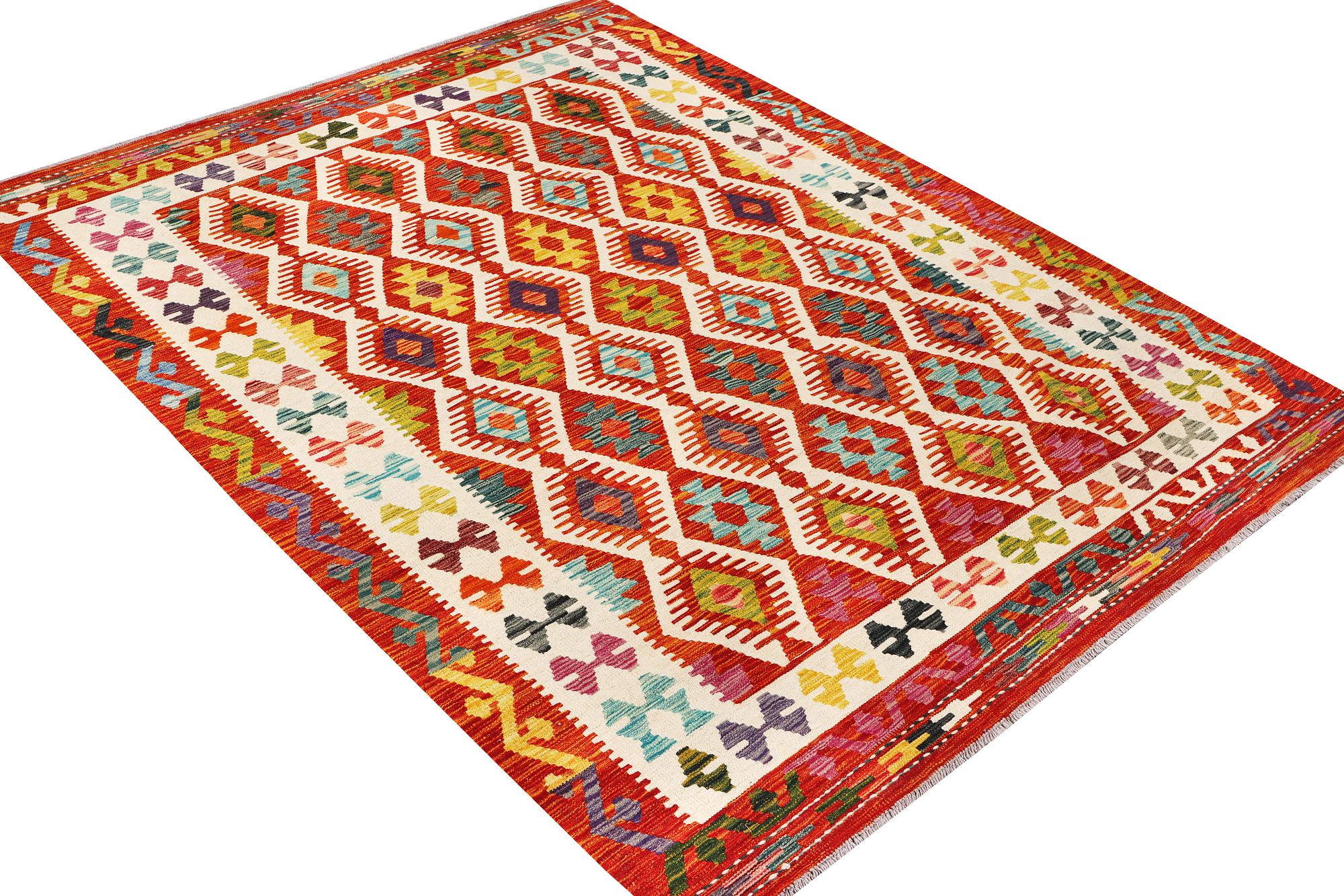 A Kilim rug, c. 242 x 181 cm.