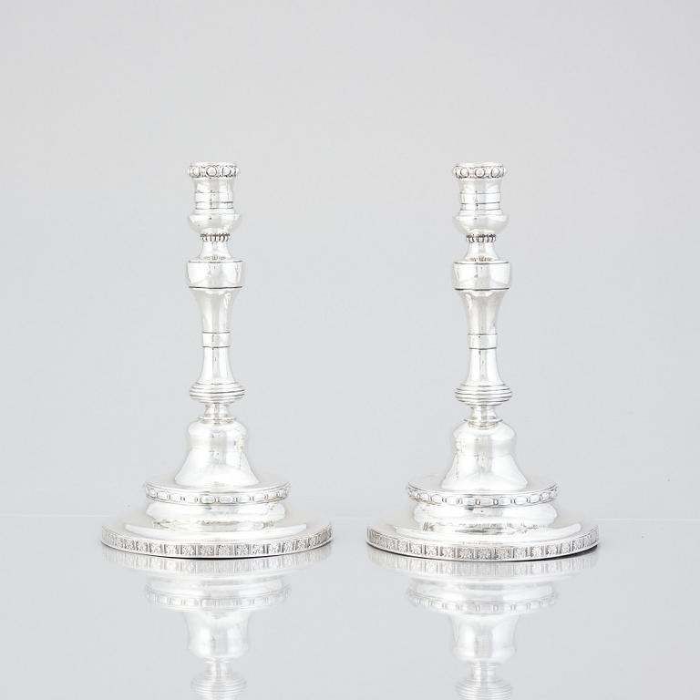 A pair of Swedish Rococo silver candlesticks, mark of Pehr Zethelius, Stockholm 1775.