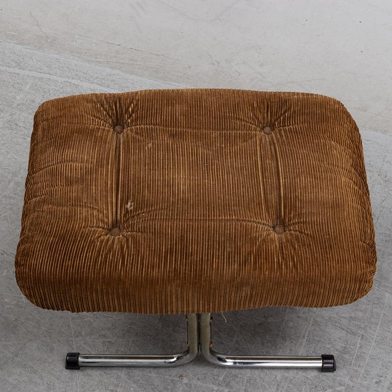 A pair of 1970's 'Luta' easy chairs and foot stools from Värnamo Sängkläder AB.