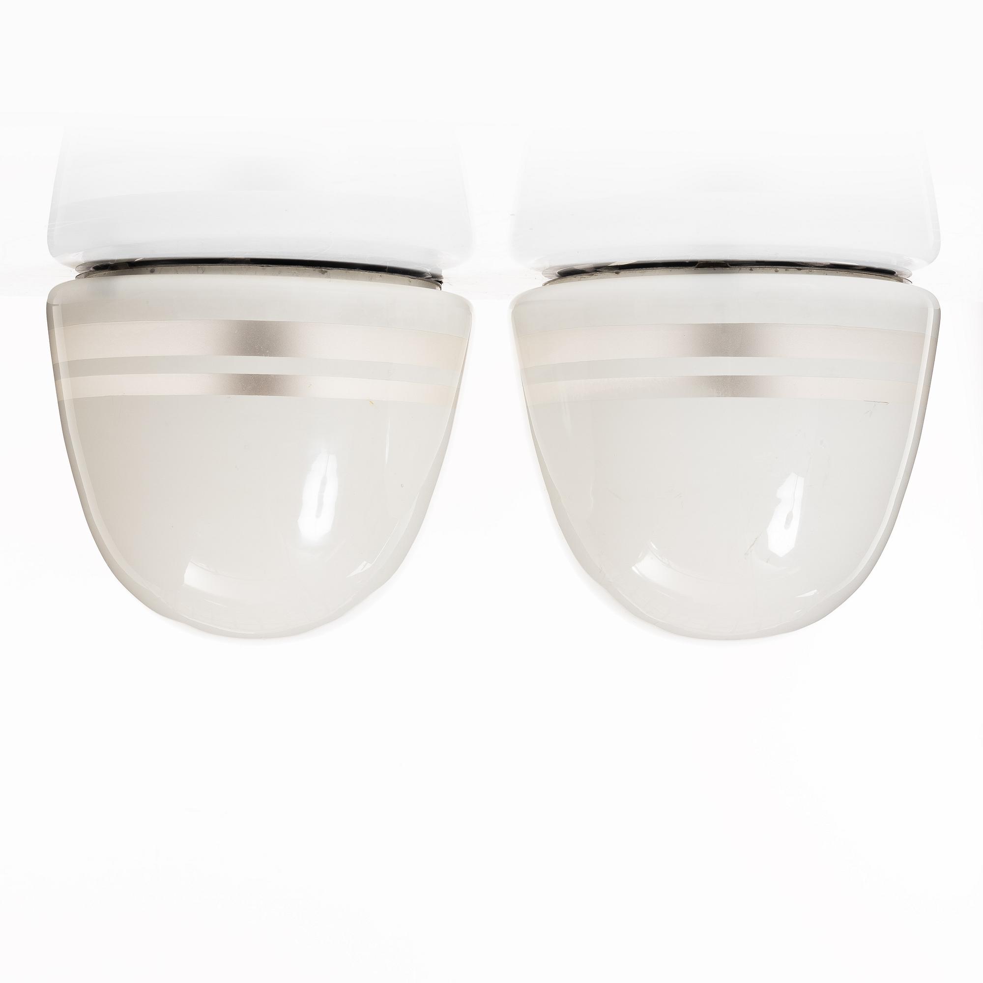 Harald Notini, a pair of ceiling lamps, variant of model "10148", Arvid Böhlmarks Lampfabrik, Stockholm, 1930s.